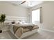Bright bedroom featuring a large window and neutral decor at 11984 Talnuck Cir, Fishers, IN 46037