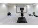 Home gym featuring a large screen, exercise equipment, and open space provides a fitness center at 11984 Talnuck Cir, Fishers, IN 46037