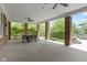 Covered patio with brick columns and an outdoor dining area at 11984 Talnuck Cir, Fishers, IN 46037