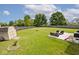 Large backyard with a shed, patio, and spacious lawn at 1222 Grand Canyon Ct, Franklin, IN 46131