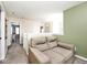 Relaxing hallway features comfortable furniture, carpeted flooring, and ample lighting at 1222 Grand Canyon Ct, Franklin, IN 46131