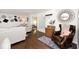 Open-concept living area with hardwood floors and comfortable seating at 1222 Grand Canyon Ct, Franklin, IN 46131