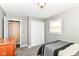 Bedroom featuring carpet floors, closet, and a window for natural light at 1308 N Main St, Lapel, IN 46051