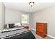 Cozy bedroom with carpet, neutral paint, and a window for natural light at 1308 N Main St, Lapel, IN 46051