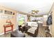 Open-concept living room with backyard access, flowing into a bright kitchen with plenty of counter space at 1308 N Main St, Lapel, IN 46051
