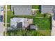 Bird's eye view shows backyard, deck, garage, and surrounding green space at 145 S 7Th Ave, Beech Grove, IN 46107