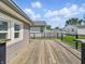 Spacious wooden deck provides perfect outdoor space for relaxing and entertainment at 145 S 7Th Ave, Beech Grove, IN 46107