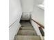 Stairway leading down to a basement or lower level with overhead lighting at 145 S 7Th Ave, Beech Grove, IN 46107