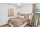 Cozy bedroom features a chandelier and neutral decor at 14931 W Black Wolf Run Dr, Carmel, IN 46033