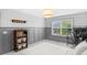 Bedroom featuring a large window, a bed, and a bookshelf with decor items at 14931 W Black Wolf Run Dr, Carmel, IN 46033