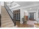 Entryway featuring a staircase and convenient built in cubbies at 14931 W Black Wolf Run Dr, Carmel, IN 46033