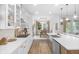 Modern, bright kitchen featuring stainless steel appliances and sleek countertops at 14931 W Black Wolf Run Dr, Carmel, IN 46033