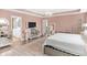 Large bedroom with hardwood floors, neutral walls, walk-in closet and stylish furnishings at 14931 W Black Wolf Run Dr, Carmel, IN 46033