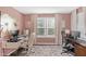 Bright office space with natural light, two workstations, and modern decor at 14931 W Black Wolf Run Dr, Carmel, IN 46033