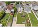Birds-eye view of a backyard with a patio, play set, and open space at 1627 Pleasant St, Indianapolis, IN 46203