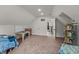 Spacious bedroom with neutral carpet, white walls, and a unique play area at 1627 Pleasant St, Indianapolis, IN 46203