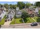 Charming curb appeal with a well-kept lawn, and mature trees at 1627 Pleasant St, Indianapolis, IN 46203