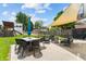 Beautifully arranged outdoor patio, featuring modern furniture and a backyard playset at 1627 Pleasant St, Indianapolis, IN 46203