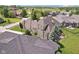 Expansive estate home boasting meticulous landscaping, basketball court, and golf course views at 16332 Valhalla Dr, Noblesville, IN 46060