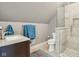 Neutral tone bathroom offers a stand-up shower and a modern sink with granite countertop at 16332 Valhalla Dr, Noblesville, IN 46060
