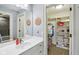 Bathroom offers a sink with storage and a closet for storage, bathed in natural light at 16332 Valhalla Dr, Noblesville, IN 46060
