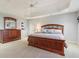 Bright bedroom features natural lighting, neutral carpet, and matching dresser and nightstand at 16332 Valhalla Dr, Noblesville, IN 46060