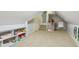 Bright ' room features built-in storage, neutral carpet, and playroom aesthetic at 16332 Valhalla Dr, Noblesville, IN 46060