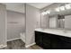 Bathroom with double sink vanity, white countertop, and walk in shower at 1704 Beach St, Greenwood, IN 46143