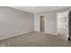 A cozy bedroom featuring plush carpeting and closet at 1704 Beach St, Greenwood, IN 46143