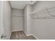 Walk-in closet with carpet flooring and wire shelving for optimal storage at 1704 Beach St, Greenwood, IN 46143