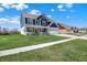 Landscaped home with green grass, and a spacious driveway, perfect for enjoying suburban living at 1704 Beach St, Greenwood, IN 46143