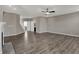 Open concept living room with hardwood floors and neutral paint at 1704 Beach St, Greenwood, IN 46143