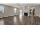 Open living room boasts natural light and fireplace at 1704 Beach St, Greenwood, IN 46143