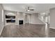 Large living room with fireplace, hardwood floors, and open floor plan at 1704 Beach St, Greenwood, IN 46143