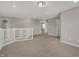 Open loft space featuring plush carpeting and natural light at 1704 Beach St, Greenwood, IN 46143
