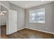 Comfortable office space featuring hardwood floors, a window with natural light, and neutral wall color at 1704 Beach St, Greenwood, IN 46143