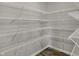 Spacious walk-in pantry featuring sturdy wire shelving for optimal organization and storage at 1704 Beach St, Greenwood, IN 46143