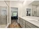 Bright bathroom with double sinks, white cabinets, and a glass-enclosed shower at 19257 Red Willow Ln, Noblesville, IN 46062