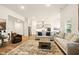 Open concept living room and kitchen with modern finishes and stainless steel appliances at 19257 Red Willow Ln, Noblesville, IN 46062