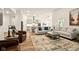 Bright, open-concept living room and kitchen area with stylish decor and ample natural light at 19257 Red Willow Ln, Noblesville, IN 46062