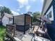 Backyard deck with hot tub, pergola, lawn chairs, and privacy fence at 201 N Tacoma Ave, Indianapolis, IN 46201