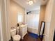 Bathroom with shower with white shower curtain and subway tile, toilet, vanity, mirror, and dark floors at 201 N Tacoma Ave, Indianapolis, IN 46201