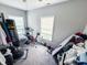 Secondary bedroom area featuring carpeted floors and natural light at 201 N Tacoma Ave, Indianapolis, IN 46201