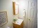 Well-maintained bathroom featuring modern fixtures, vanity, and toilet at 21 Roderick Ct, Beech Grove, IN 46107