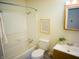 Clean bathroom with shower-tub combination and vanity with neutral paint at 21 Roderick Ct, Beech Grove, IN 46107