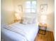 Serene bedroom featuring a comfortable bed, neutral decor, and soft lighting at 21 Roderick Ct, Beech Grove, IN 46107