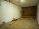 Spacious garage featuring an accessible storage area and plenty of room for parking and projects at 21 Roderick Ct, Beech Grove, IN 46107