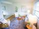 Bright living room featuring stylish decor, ample natural light, and cozy seating at 21 Roderick Ct, Beech Grove, IN 46107