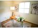 Comfortable office space with a bright window view, desk, and modern lighting at 21 Roderick Ct, Beech Grove, IN 46107