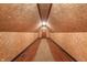 Unfinished attic featuring wood paneling and a wood floor at 2411 N County Road 500 W, Muncie, IN 47304